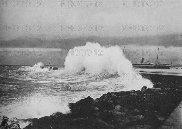 'Breakwater, Colombo, During S.-W. Monsoon', c1890 (1910). Artist: Alfred William Amandus Plate.