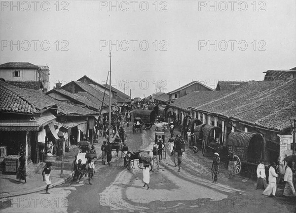 'Typical Street Scene in Native Quarters, Colombo', c1890, (1910). Artist: Alfred William Amandus Plate.