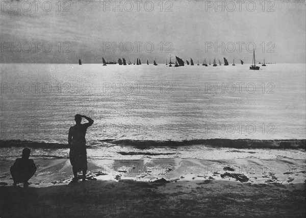 'Pearling Fleet Coming Back to Anchorage at Sunset', c1890, (1910). Artist: Alfred William Amandus Plate.