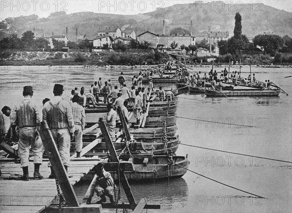 'Building a pontoon bridge over a French stream', 1915. Artist: Unknown.