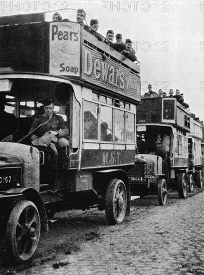 'British troops being moved to a fresh part of the line by motor 'buses', 1915. Artist: Unknown.