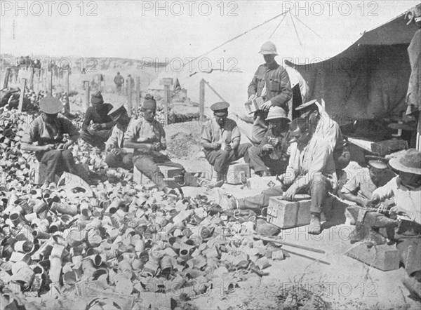 'Making bombs out of tin cans in Gallipoli', 1915. Artist: Unknown.