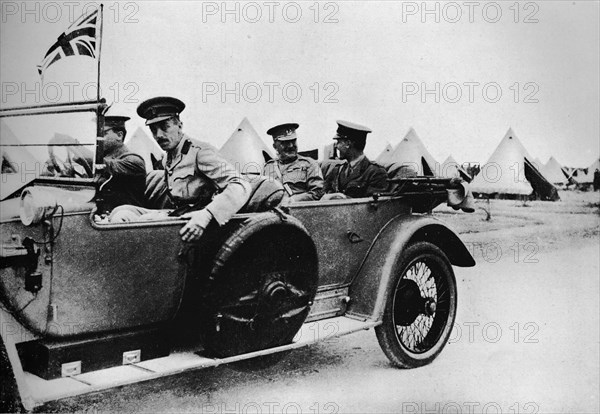 'General Sir John Maxwell, commander of Egyptian troops, motoring through one of the camps', 1915. Artist: Unknown.