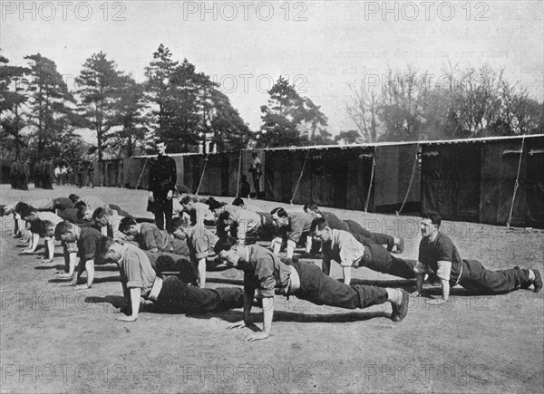 'Recruits to the Grenadier Guards at physical drill at Caterham, where the Brigade of Foot Guards de Artist: Unknown.