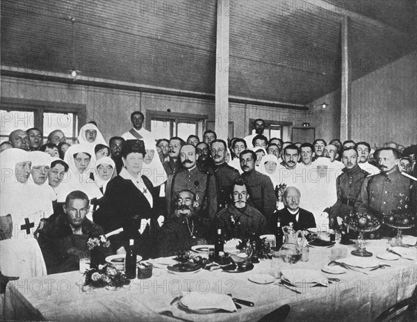 'Russian prisoners exchanged from Germany being entertained to lunch', 1915. Artist: Unknown.