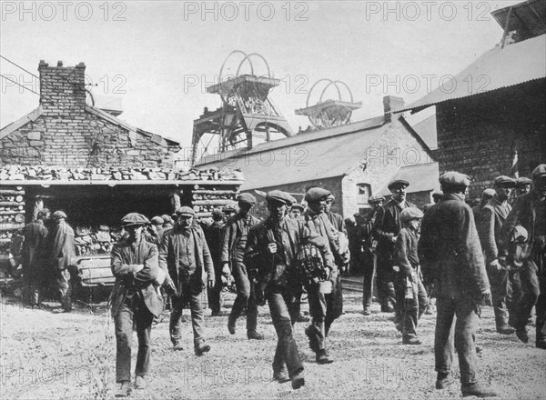 'Miners leaving the pithead after the expiration of their strike notices', 1915. Artist: Unknown.