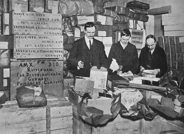 'Packing gifts for despatch to British prisoners in Germany', 1915. Artist: Unknown.