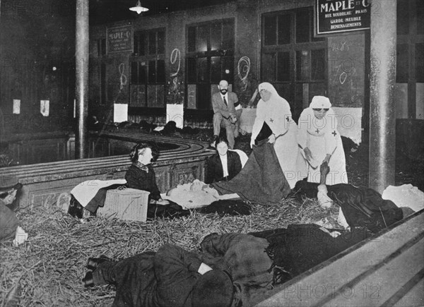 'Customs Room at the Gare du Nord, Paris, a relief station for French refugees', 1914. Artist: Unknown.