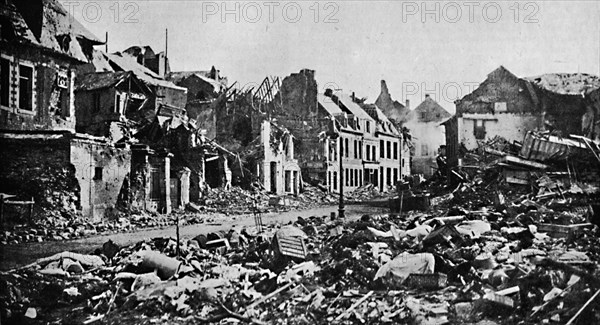 'A Scene of Desolation. - A Street in Peronne', 1919. Artist: War Office.