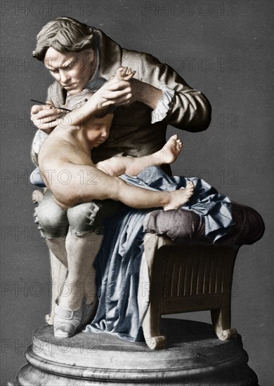 Edward Jenner, English physician, vaccinating his son, c1796 (c1900).  Artist: Giulio Monteverde.