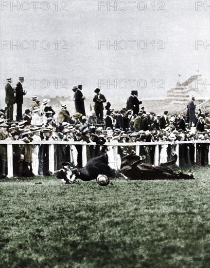 Emily Davison throwing herself in front of the King's horse during the Derby, Epsom, Surrey, 1913. Artist: Unknown.