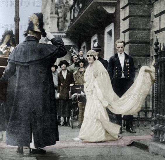 Lady Elizabeth Bowes-Lyon on her way to be married at Westminster Abbey, 26 April 1923, (1937). Artist: Unknown.