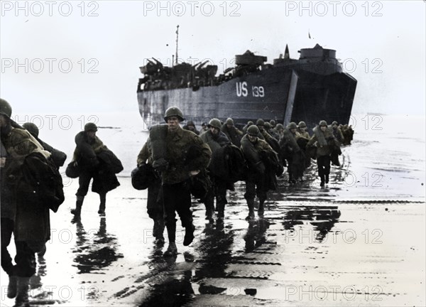 American troops disembark onto the sands of Normandy, 1944. Artist: Unknown.