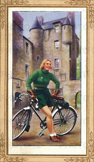 'Lady Cyclist, 1939', 1939. Artist: Unknown.