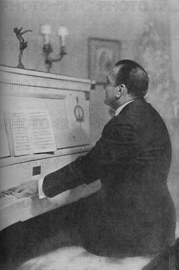 'Enrico Caruso - Italy's Famous Tenor at the Piano', c1925. Artist: Unknown.