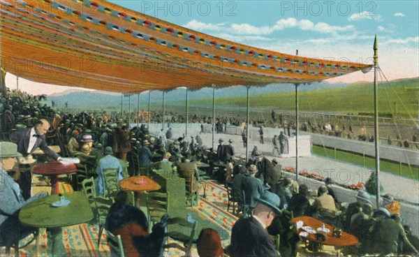 'Watching the Races in front of Club House, Agua Caliente Jockey Club', c1939. Artist: Unknown.