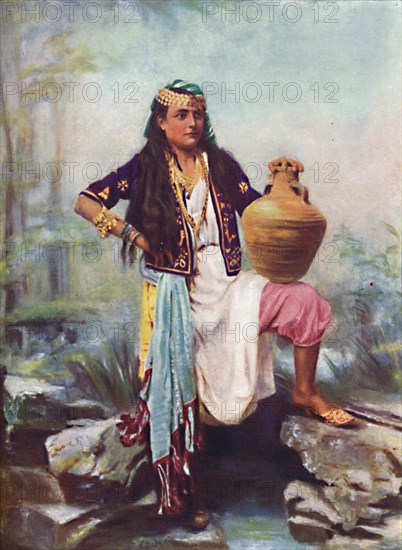 A Syrian girl at a spring, 1902. Artist: Unknown.