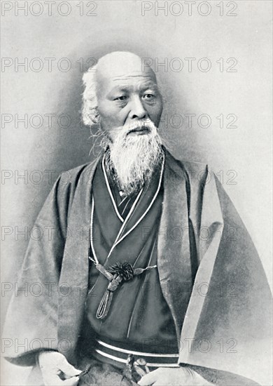 An aged Japanese doctor in full dress costume, 1902. Artist: Unknown.