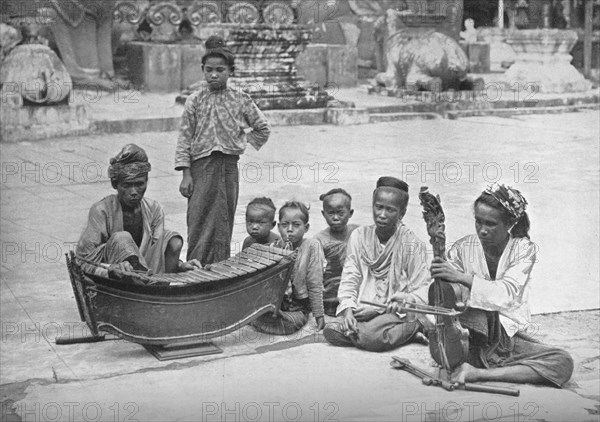 Burmese musicians, 1902. Artist: P Klier.