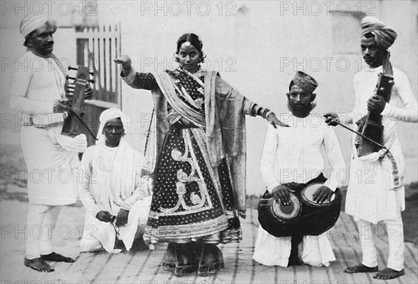 Nautch girl with musicians, 1902. Artist: Kapp & Co.