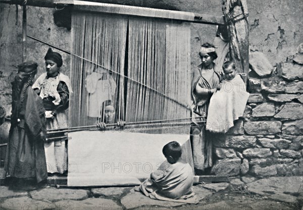 Kabyle weavers and native loom, Northern Algeria, 1912. Artist: Legrand.