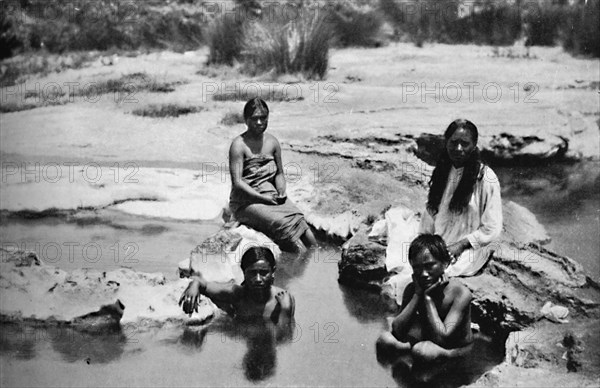 Maoris bathing in a hot pool, 1902. Artist: Muir & Moodie.