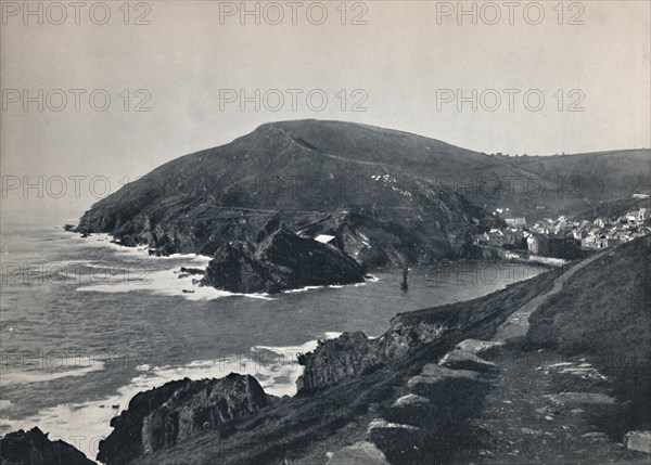 'Polperro - The Inlet and the Village', 1895. Artist: Unknown.