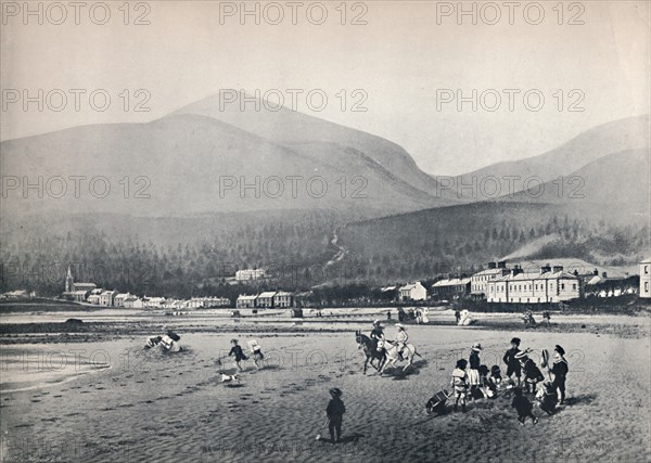 'Newcastle, Co. Down. - The Strand, with Slieve Donard', 1895. Artist: Unknown.