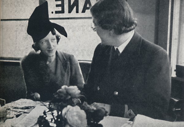 'A different hat soon', 1941. Artist: Cecil Beaton.