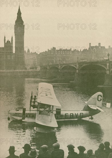 'The 'Calcutta' Flying-Boat Moored in the Thames opposite the Houses of Parliament', 1927. Artist: Unknown.