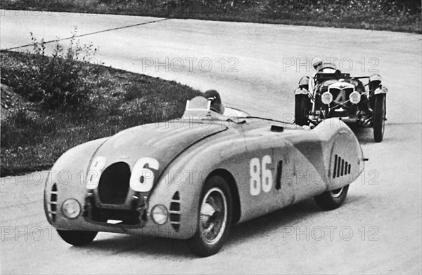 'French Grand Prix, 1936: A new streamlined Bugatti, followed by a Riley', 1936, (1937). Artist: Unknown.