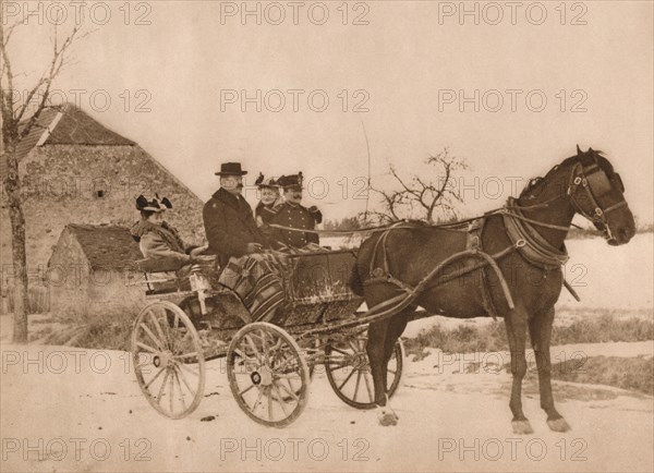 'Men and women in a horse-drawn carriage', 1937. Artist: Louis Guichard.