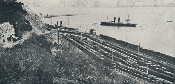 'Fishguard Harbour', 1910. Artist: Great Western Railway Co.