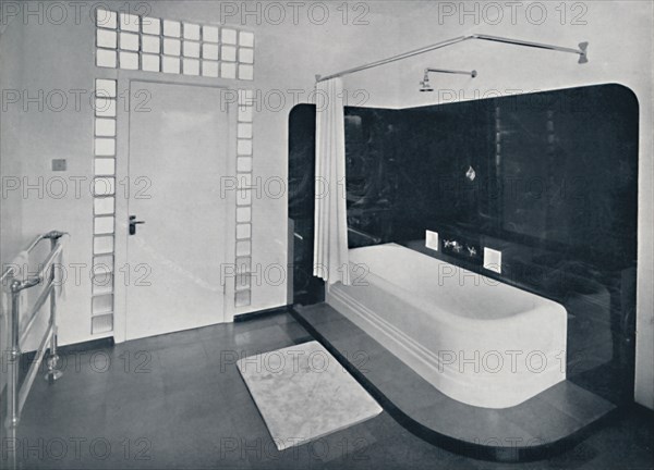 'Robin Byng - Bathroom in Grosvenor Square, London, showing te Insulight glass blocks made by Pilk Artist: Unknown.