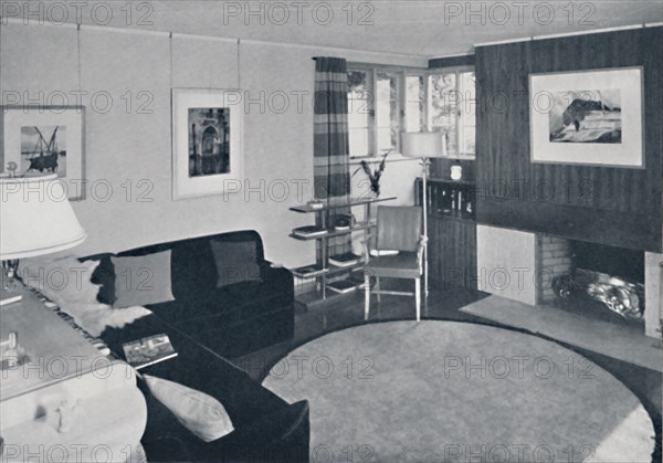 'Sewall Smith. Living-room in the architect's own home at Niagara Falls, N.Y., in a turquoise, coral Artist: Unknown.