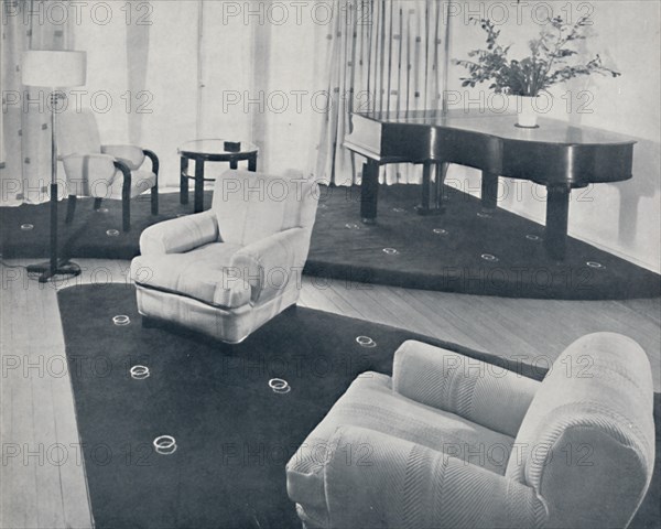 'A lounge, designed and carried out by Ian Henderson & Co., London', 1935. Artist: Unknown.