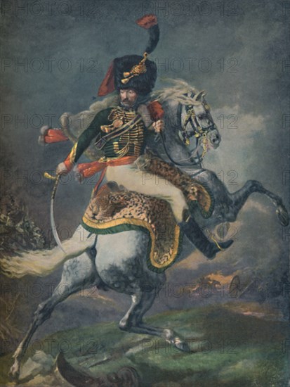 'Officer of the Mounted Chasseurs Charging. (Imperial Guard)', c1812, (1896). Creator: Unknown.