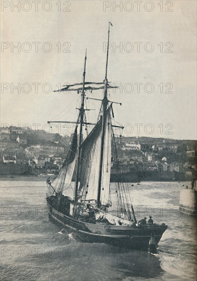 'Sailing Into Newlyn Harbour, the Isabella, a two-masted Lancashire type schooner', 1937 Artist: Unknown.