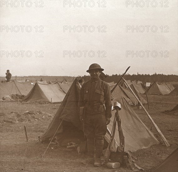 Soldier standing by tent, American camp, Melette, France, c1914-c1918. Artist: Unknown.