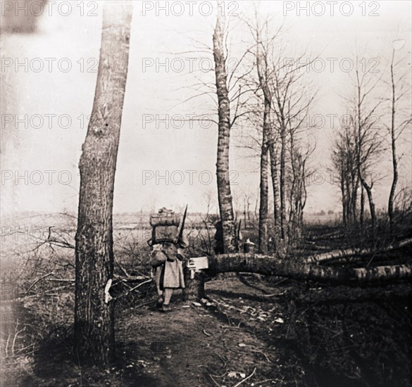 Soldier with pack on his back, c1914-c1918. Artist: Unknown.