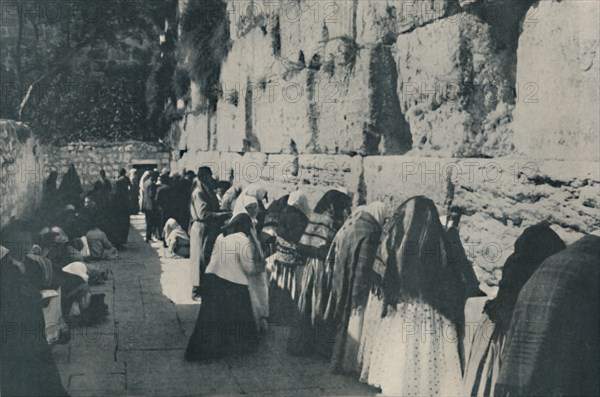 'The Wailing Wall: The Day of Lamentation for the Lost City of their Forefathers', c1935.  Artist: Unknown.