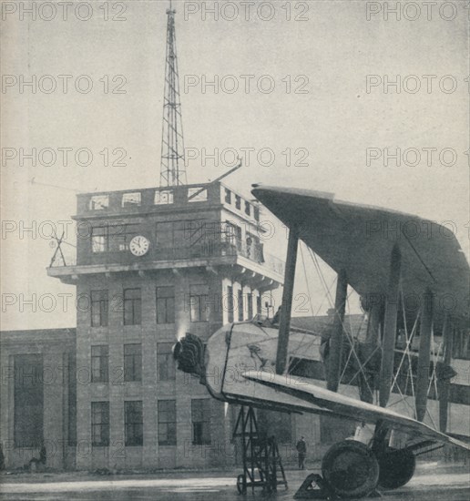 'Where Officers of a Great Aerodrome Keep Contact with the Flying Pilots', c1935. Artist: Unknown.