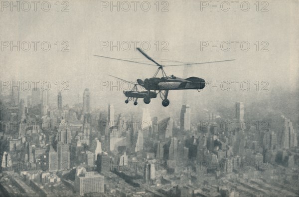 'Solution of Aerial Transport Problems in Cities: Aeroplanes That Require No Aerodromes', c1935. Artist: Wide World Photos.