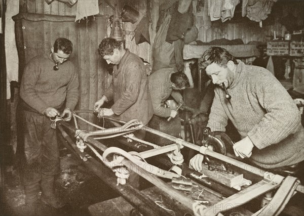 'Preparing Sledges for the Polar Journey (Crean, Forde, Lashly, P.O. Evans)', c1911, (1913).  Artist: Herbert Ponting.