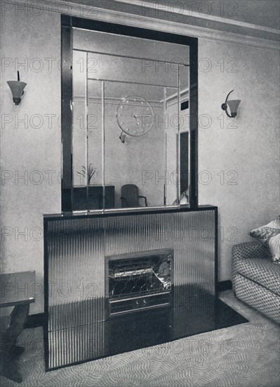 'Electric fireplace and overmantel by James Clark & Son Ltd.', 1940. Artist: Unknown.