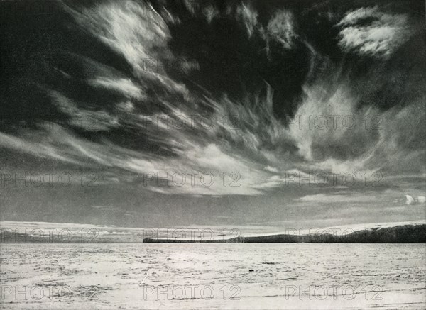 'Remarkable Cirrus Clouds Over The Barne Glacier', 19 Dec 1911, (1913). Artist: Herbert Ponting.