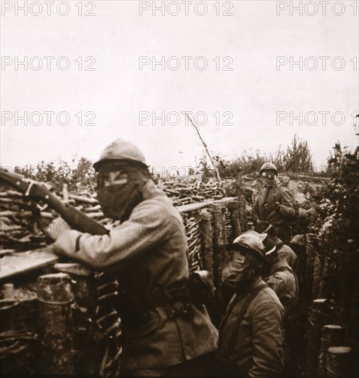 Gas alert in trenches, Champagne, northern France, 1916. Artist: Unknown.