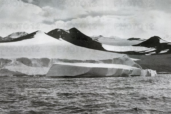 'A Berg Calving from a Glacier at Cape Crozier', c1911, (1913). Artist: Herbert Ponting.