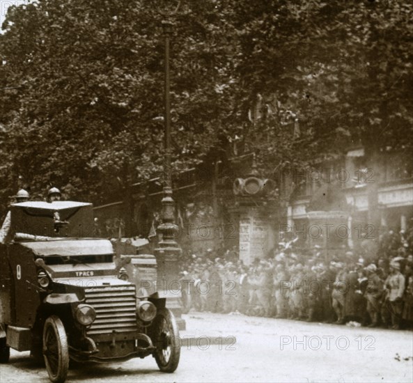 Machine gun mounted in armoured vehicle, victory parade, c1918. Artist: Unknown.