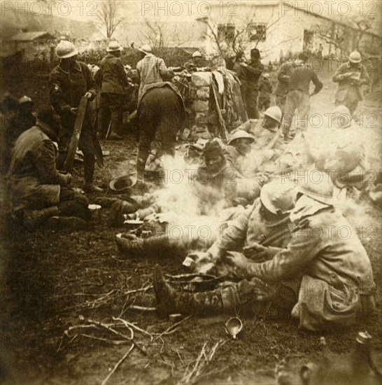 Infantrymen at makeshift kitchen, Cussy farm, Craonne, northern France, c1914-c1918. Artist: Unknown.